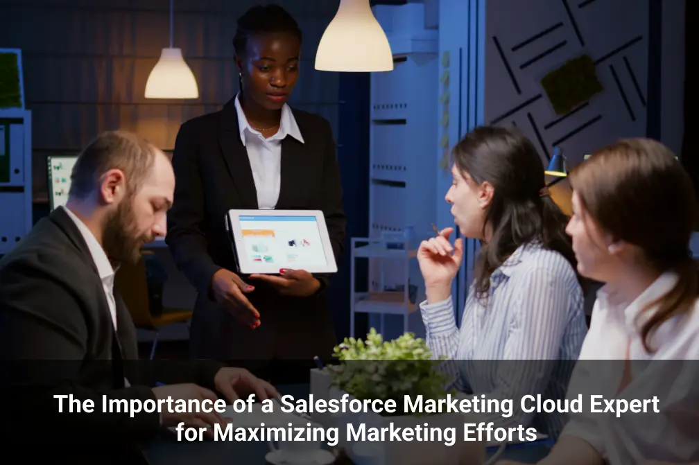 A group of professionals in an office setting, with one person presenting data on a tablet. The image highlights the value of a Salesforce Marketing Cloud expert.